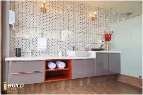 i Build Interiors are Manufacturers of kitchens, wardrobes, and interiors.